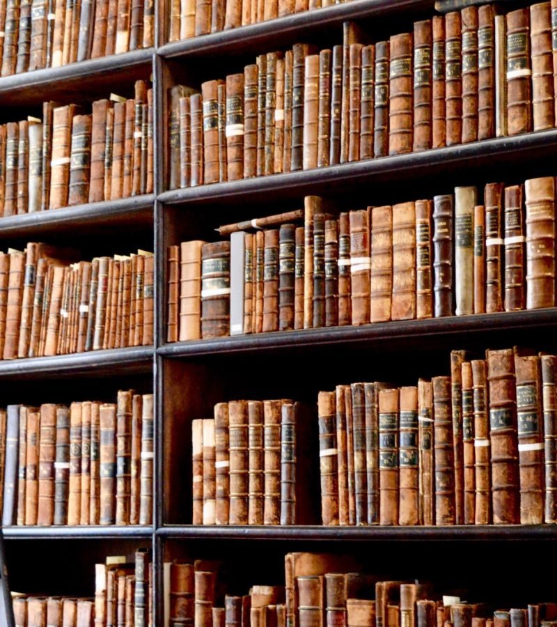 hundreds-of-old-books-in-the-library-of-trinity-college-in-dublin-ireland-with-a-ladder-to-reach-.jpg