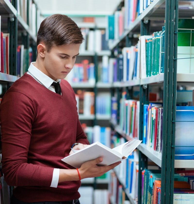 student-searching-book-in-university-library.jpg